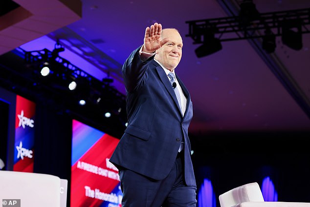 White House Border Czar Tom Homan waves towards the crowd as he takes the stage during Conservative Political Action Conference